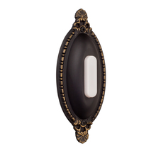 Craftmade BSOO-AZ - Surface Mount Oval Ornate LED Lighted Push Button in Antique Bronze